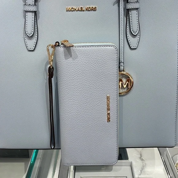 MICHAEL KORS LARGE TRAVEL CONTINENTAL WRISTLET WALLET PHONEHOLDER Vista Blue